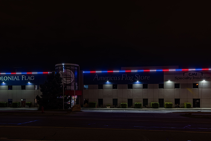 Green architectural lighting on a business