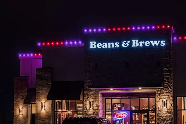 Coffee shop with magenta permanent lighting