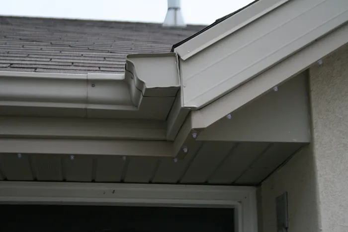 Close view of low-profile permanent lighting channel under residential trim