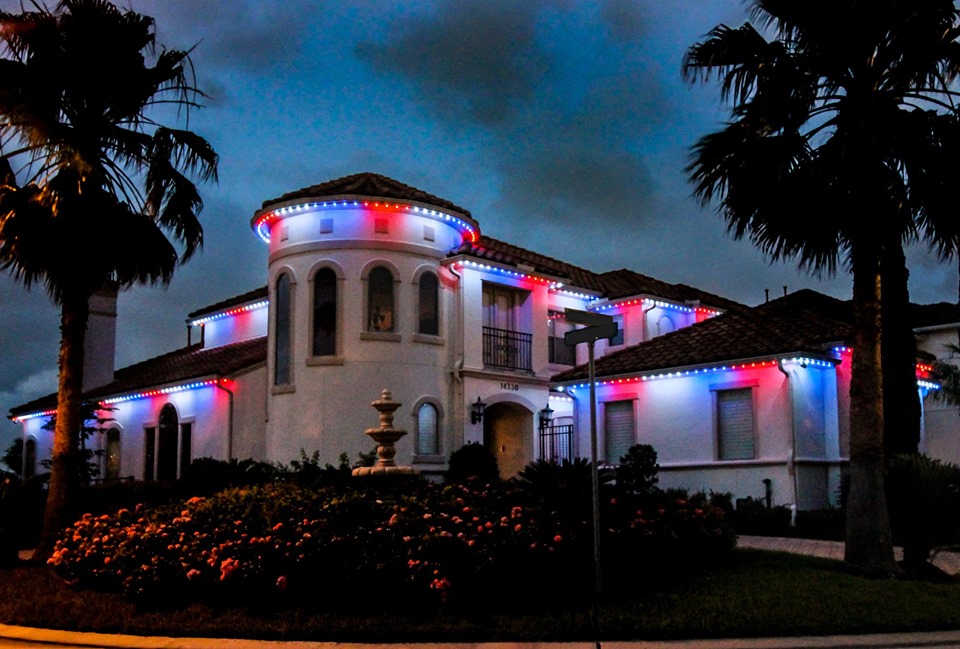 Residential estate with red white and blue permanent lighting