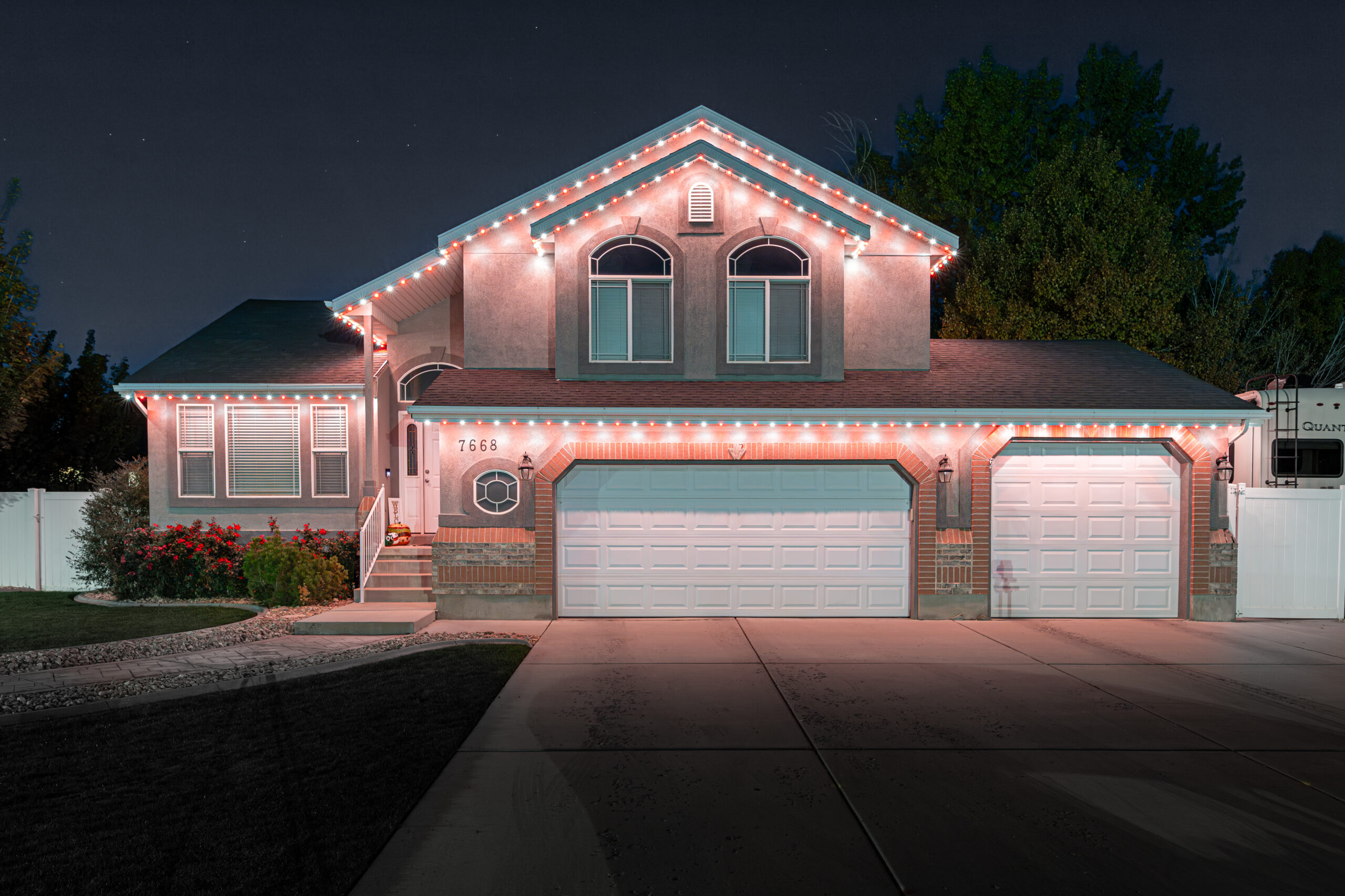 Warm white permanent lighting on a residential estate